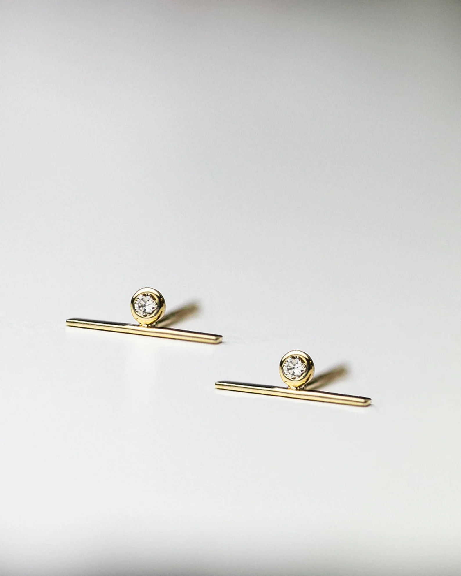 14k Lind bar studs with diamond accent